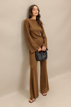 FLARE TOUCH SOLID TUNIC TOP
